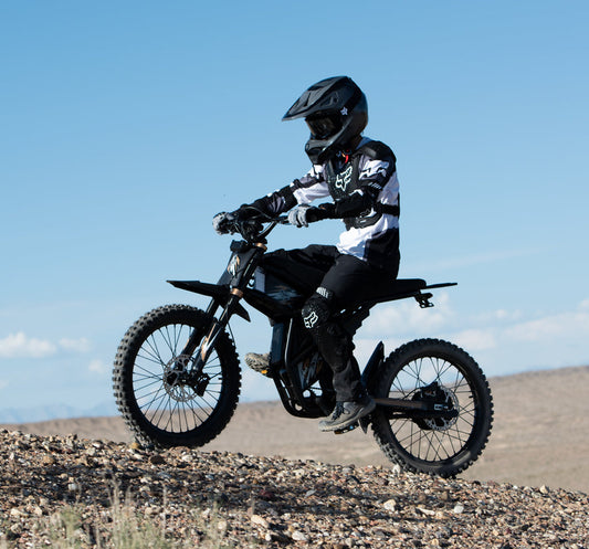 A rider testing the GT73 Pro Electric Bike Performance on a steep, rocky gravel trail to showcase off-road stability.