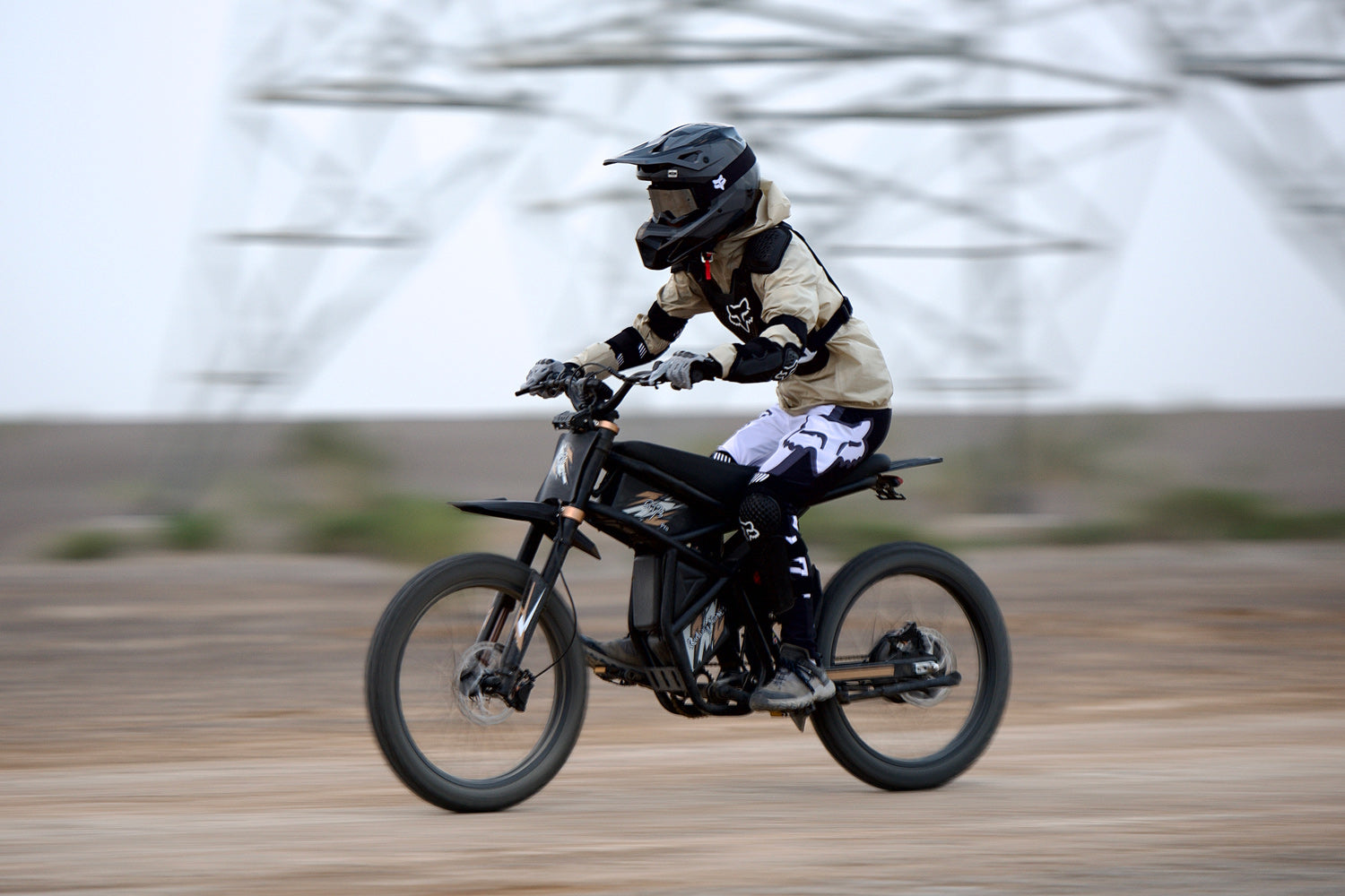 Person riding a motorcycle GT73 Pro on a blurred background