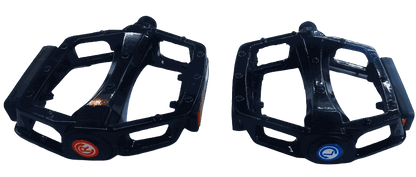 Pedal set with black plastic body and metal parts, featuring red and blue circular accents on each pedal respectively